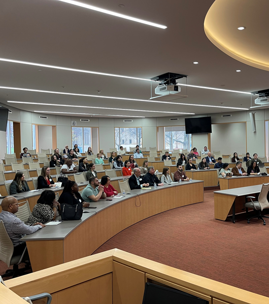 Prospective students attending an info session